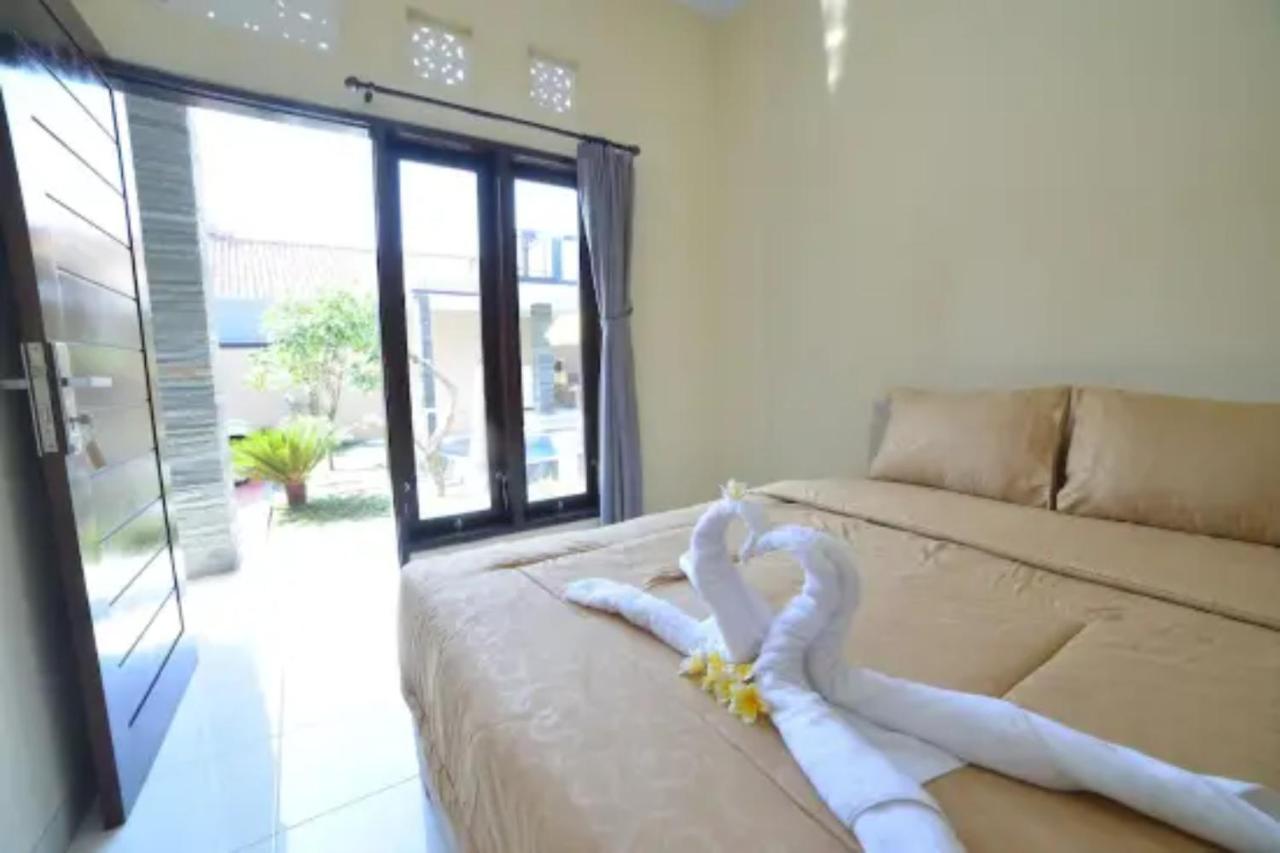 Oyo Flagship 91237 Ratu Guest House Kedunganan Kültér fotó