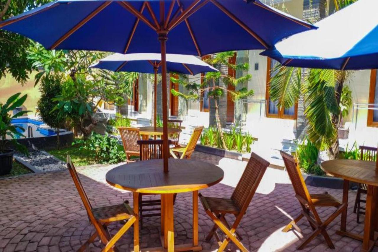 Oyo Flagship 91237 Ratu Guest House Kedunganan Kültér fotó